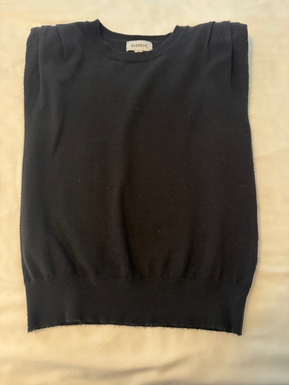 Evereve brand Yara Classic Black Crewneck Sweater Vest with shoulder pads